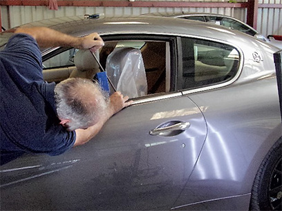 technicien-débosselage-sans-peinture technicien-débosselage-sans-peinture